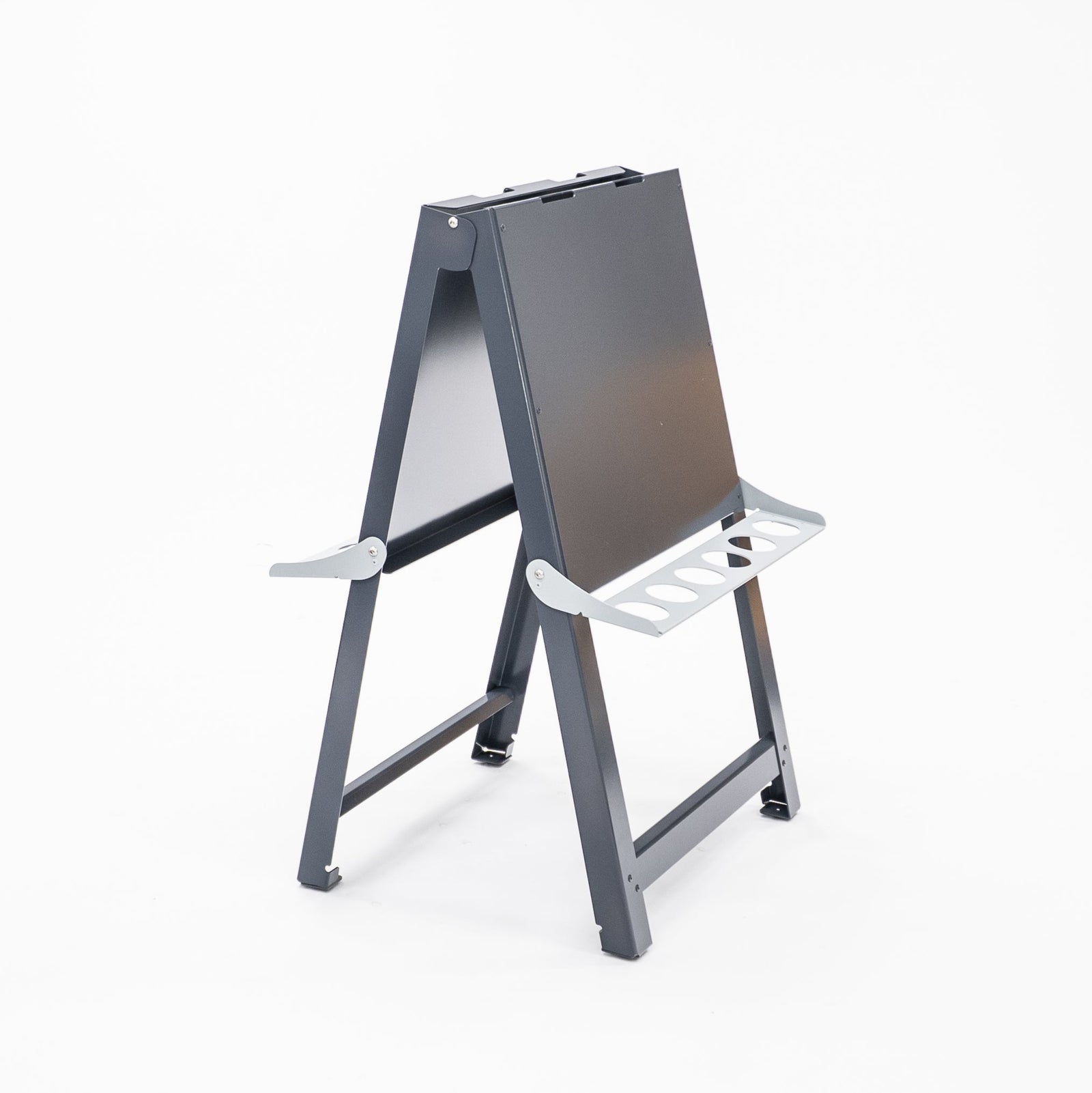 Australian-made medium double-sided painting easel folded flat for compact storage. Lightweight aluminium and powder-coated steel frame designed for daily use in childcare, day care and primary school environments.