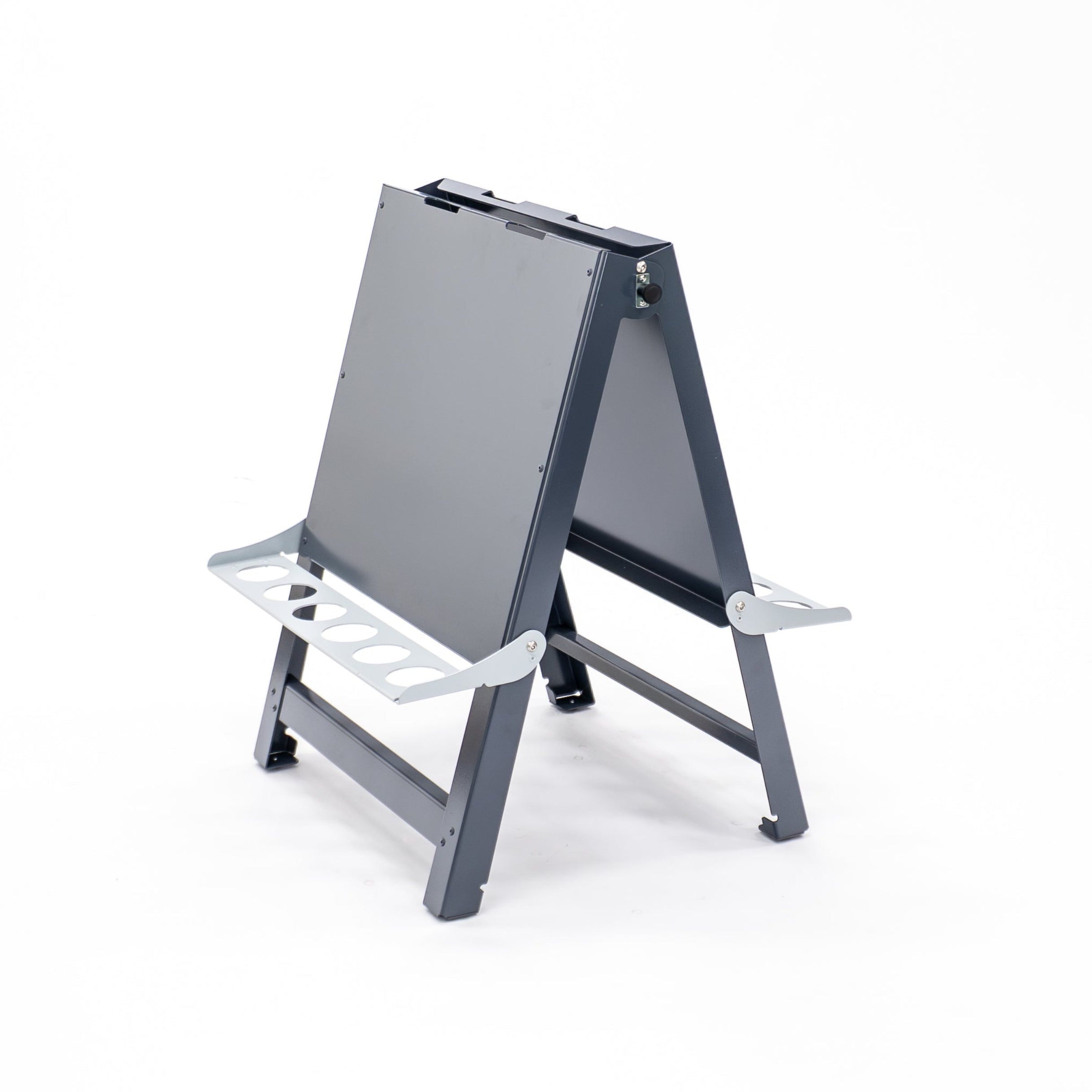 Australian-made toddler double-sided painting easel folded flat for compact storage. Lightweight aluminium and powder-coated steel frame wipes or hoses clean with ease. Built for daily indoor and outdoor use in childcare, preschool, daycare and early learning environments