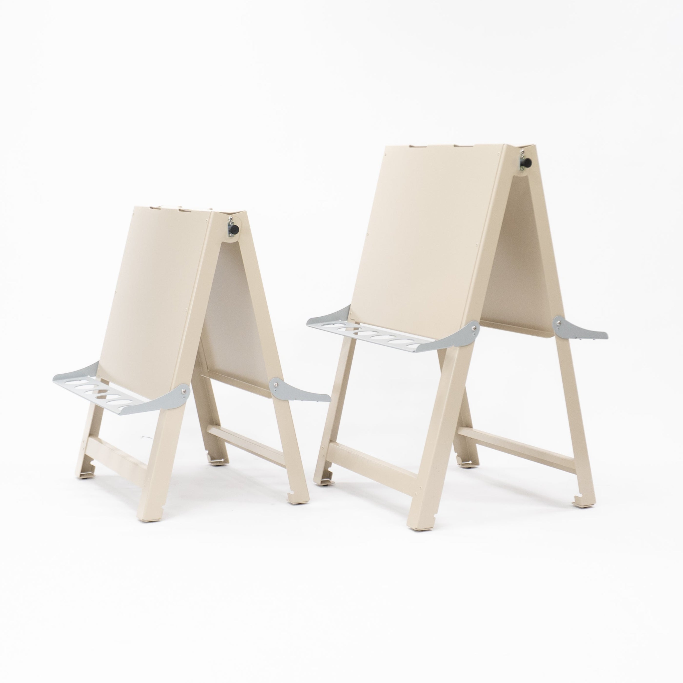 Double-sided painting easel sized for toddlers, crafted from durable aluminium and powder-coated steel for easy cleaning after messy play. Supports A2 paper secured by pegs or clips, allowing two toddlers to create side by side. Ideal art resource for early childhood educators, childcare centres, daycare and preschool settings supporting creative play and fine-motor skills.