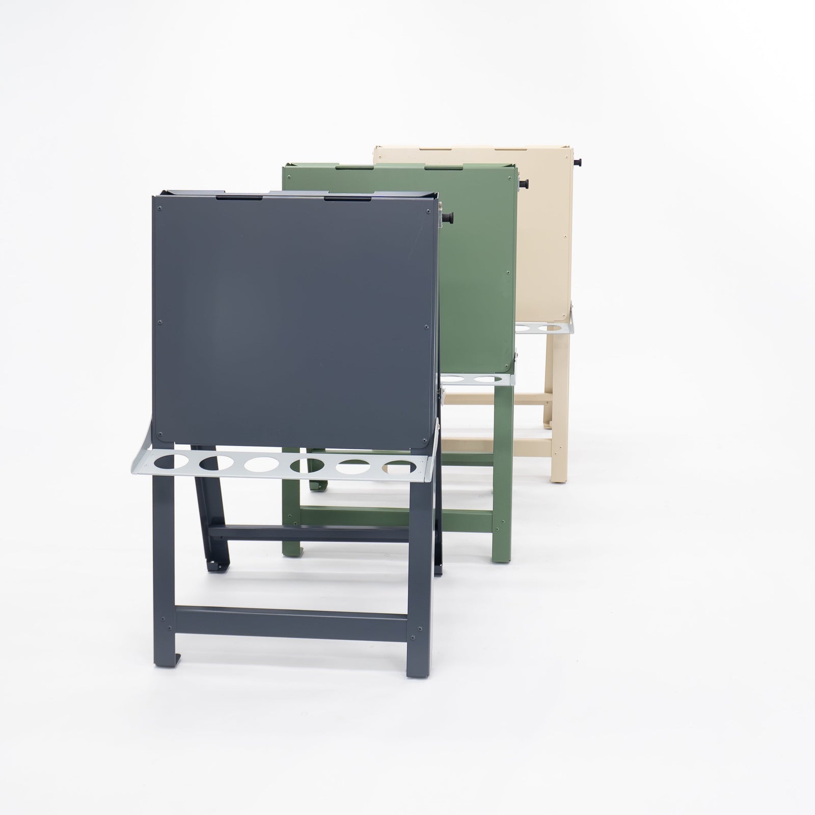 Australian-made medium double-sided painting easel folded flat for compact storage. Lightweight aluminium and powder-coated steel frame designed for daily use in childcare, day care and primary school environments.
