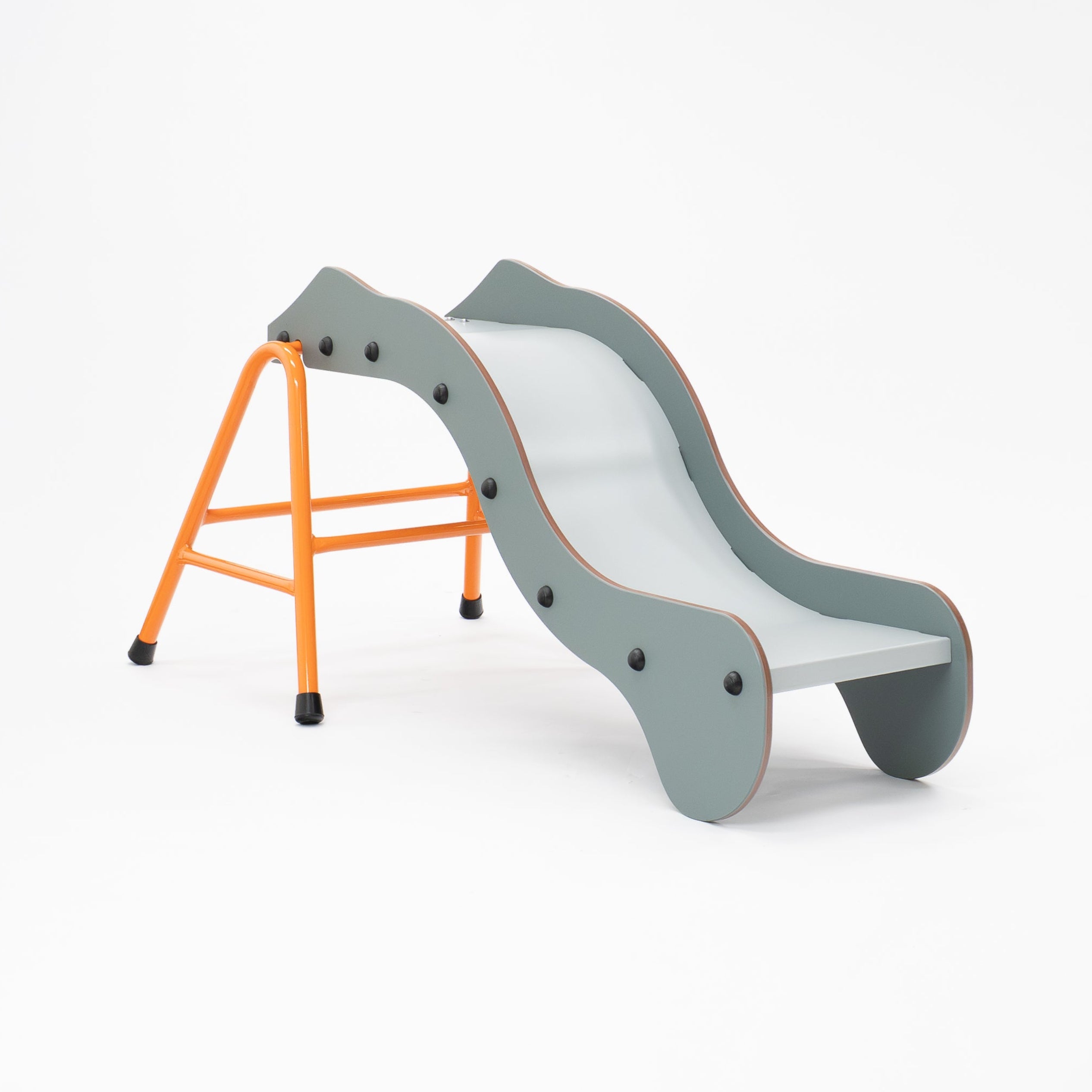 Aussie Play Short Slide attached to a Wide Trestle outdoors, encouraging active movement and imaginative play for toddlers aged 2–5.