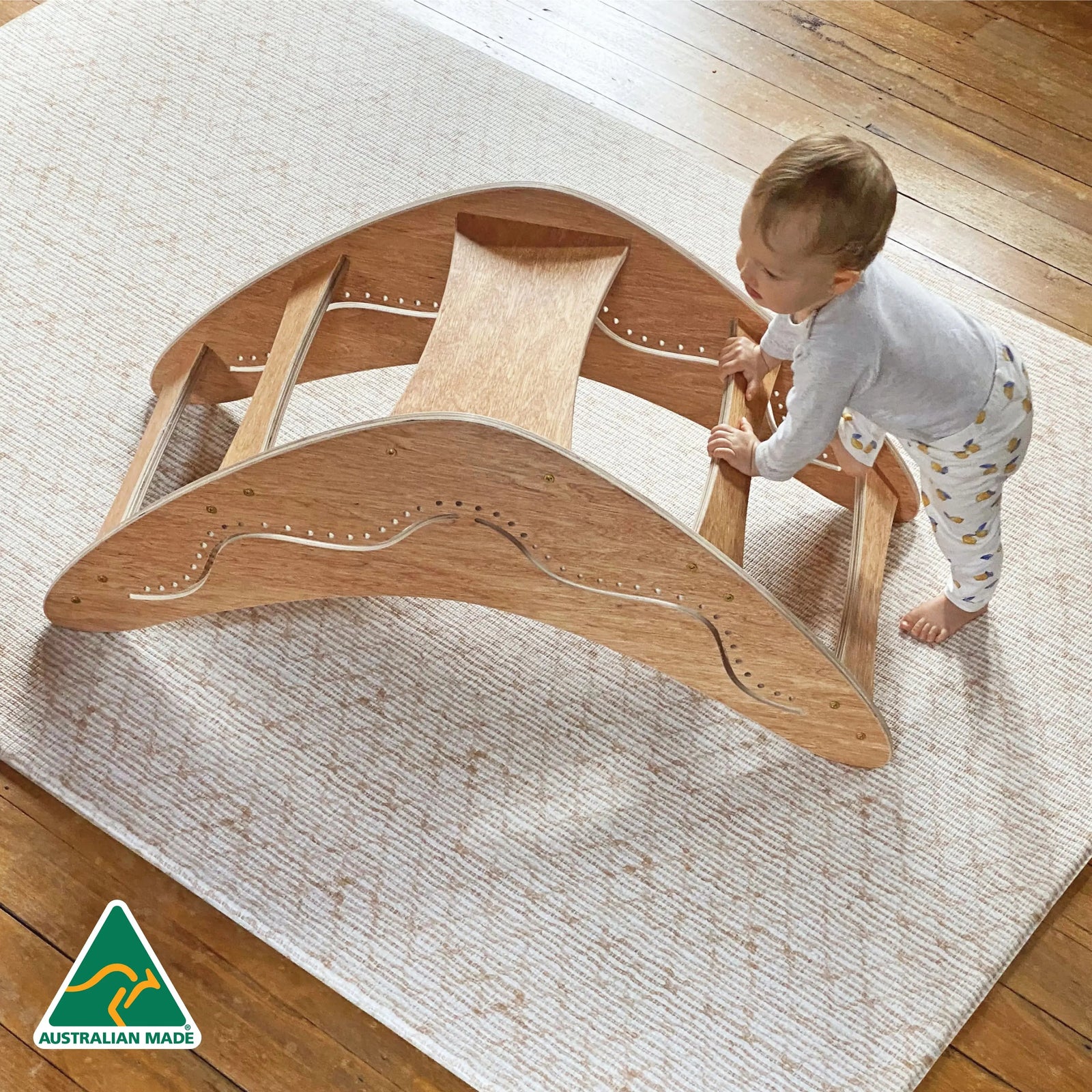 Boomerang Climber — Australian-made wooden boomerang climber rocker for early childhood gross motor play